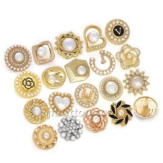 Auksinės palto sagos