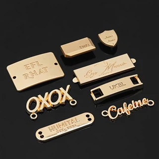 Individualizuotos rankinės metalinės logotipo plokštės
